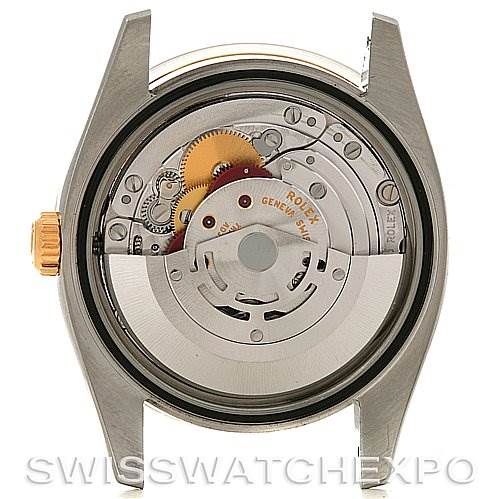 The image shows the back view of the Rolex Datejust 116203 Men's Stainless Steel Black Dial 116203 Men's Stainless Steel Black Dial model, focusing on its movement and internal mechanisms.