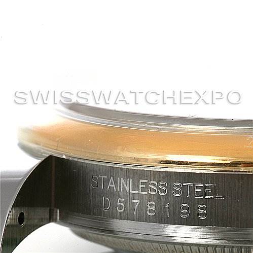 This image shows a side angle of the Rolex Datejust 116203 Men's Stainless Steel Black Dial 116203 Men's Stainless Steel Black Dial watch, highlighting the stainless steel casing and partial bezel.