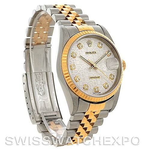 This image shows a Rolex Datejust 16233 Men's Steel and Gold (two tone) Silver Dial 16233 Men's Steel and Gold (two tone) Silver Dial watch at a three-quarter angle, highlighting the bracelet, dial, case, and fluted bezel.