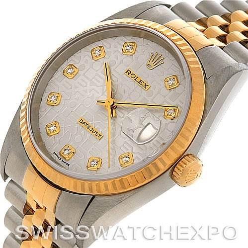 The image shows a close-up of a Rolex Datejust 16233 Men's Steel and Gold (two tone) Silver Dial 16233 Men's Steel and Gold (two tone) Silver Dial watch at a slight angle, highlighting its dial, bezel, crown, and part of the bracelet.