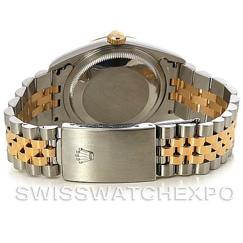 The image shows the back view of a Rolex Datejust 16233 Men's Steel and Gold (two tone) Silver Dial 16233 Men's Steel and Gold (two tone) Silver Dial watch, focusing on the gold and silver bracelet and clasp.