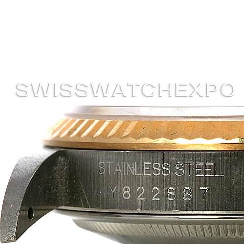 This image shows a close-up of the side of a Rolex Datejust 16233 Men's Steel and Gold (two tone) Silver Dial 16233 Men's Steel and Gold (two tone) Silver Dial watch, highlighting the lugs, case, and part of the bezel.