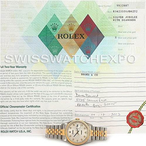 The image shows a Rolex Datejust 16233 Men's Steel and Gold (two tone) Silver Dial 16233 Men's Steel and Gold (two tone) Silver Dial watch from a front angle, along with its warranty and certification papers.