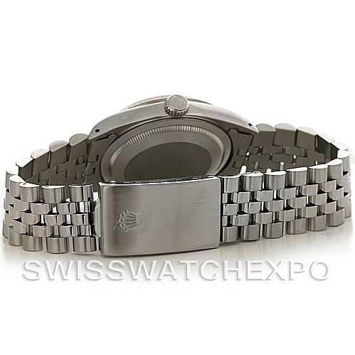 The image shows the back view of a Rolex Datejust 16234 Men's Stainless Steel White Dial 16234 Men's Stainless Steel White Dial watch, highlighting the stainless steel case and Jubilee bracelet with a clasp.