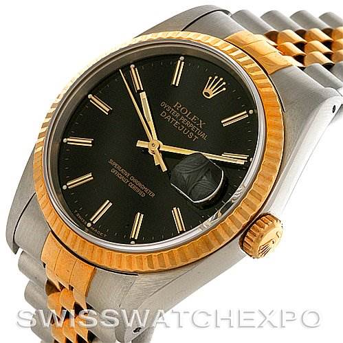 The image shows a Rolex Datejust 16233 Men's Steel and Gold (two tone) Black Dial 16233 Men's Steel and Gold (two tone) Black Dial watch angled slightly from the front, highlighting the fluted bezel, dial, crown, and two-tone bracelet.