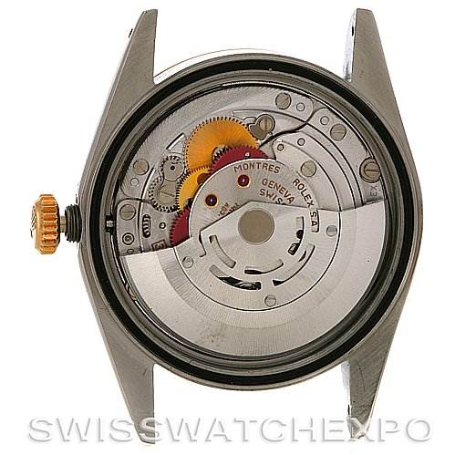 The image shows the back view of a Rolex Datejust 16233 Men's Steel and Gold (two tone) Black Dial 16233 Men's Steel and Gold (two tone) Black Dial watch, highlighting its internal mechanical movement components.