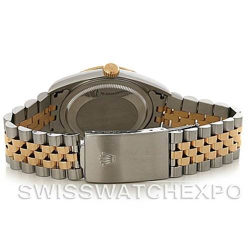 This image shows the back of the Rolex Datejust 16233 Men's Steel and Gold (two tone) Silver Dial 16233 Men's Steel and Gold (two tone) Silver Dial watch and its two-tone metal bracelet from an underside angle.