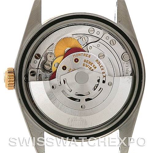 This image shows a close-up view of the movement and internal mechanisms of a Rolex Datejust 16233 Men's Steel and Gold (two tone) Silver Dial 16233 Men's Steel and Gold (two tone) Silver Dial watch from the back.