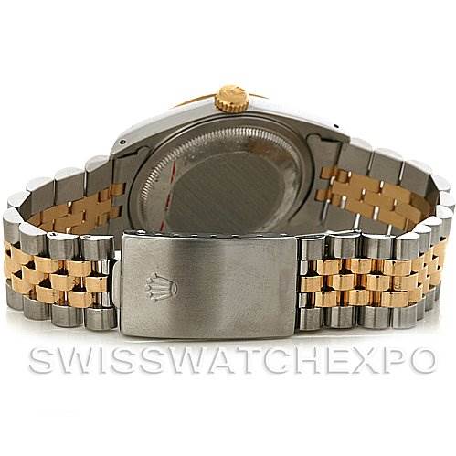 This image shows the back of a Rolex Datejust 16233 Men's Steel and Gold (two tone) Champagne Dial 16233 Men's Steel and Gold (two tone) Champagne Dial watch, focusing on the case back and the two-tone bracelet with a clasp.