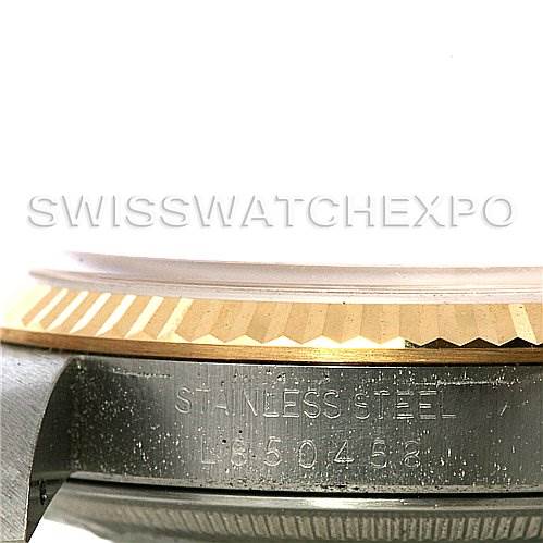 This image shows a close-up of the side profile of a Rolex Datejust 16233 Men's Steel and Gold (two tone) Champagne Dial 16233 Men's Steel and Gold (two tone) Champagne Dial, highlighting the watch's fluted bezel and part of the case.