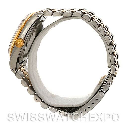 This side view of the Rolex Datejust 16233 Men's Steel and Gold (two tone) White Dial 16233 Men's Steel and Gold (two tone) White Dial watch displays the case, crown, bracelet, and clasp.