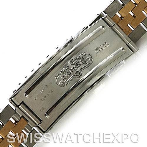 This image shows the clasp and part of the bracelet of a Rolex Datejust 16233 Men's Steel and Gold (two tone) White Dial 16233 Men's Steel and Gold (two tone) White Dial watch.