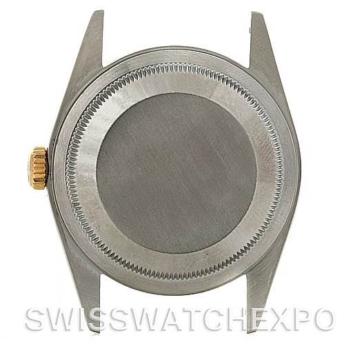 This image shows the case back and crown of a Rolex Datejust 16233 Men's Steel and Gold (two tone) Champagne Dial 16233 Men's Steel and Gold (two tone) Champagne Dial watch from a nearly top-down angle.