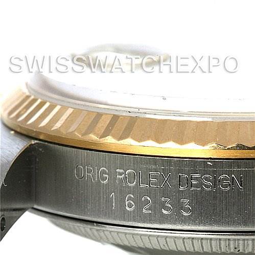 This image shows a close-up of the case and bezel of a Rolex Datejust 16233 Men's Steel and Gold (two tone) Champagne Dial 16233 Men's Steel and Gold (two tone) Champagne Dial model, displaying its model number 16233.
