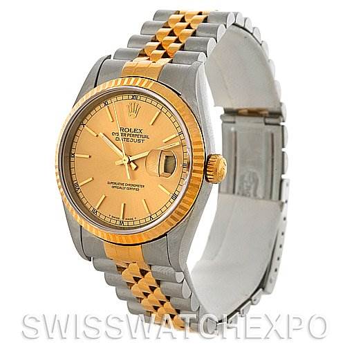 The Rolex Datejust 16233 Men's Steel and Gold (two tone) Champagne Dial 16233 Men's Steel and Gold (two tone) Champagne Dial watch is shown at a three-quarter angle, displaying its face, bezel, crown, and bracelet.