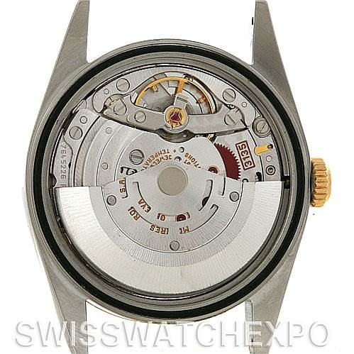 This image shows the back view of a Rolex Datejust 16233 Men's Steel and Gold (two tone) Champagne Dial 16233 Men's Steel and Gold (two tone) Champagne Dial watch, highlighting its internal mechanical movement.