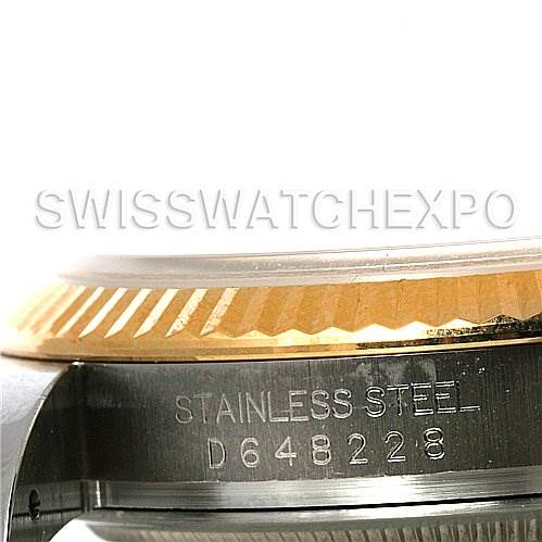 This image shows a close-up of the side of a Rolex Datejust 116233 Men's Stainless Steel White Dial 116233 Men's Stainless Steel White Dial watch, highlighting the model's serial number and stainless steel casing.