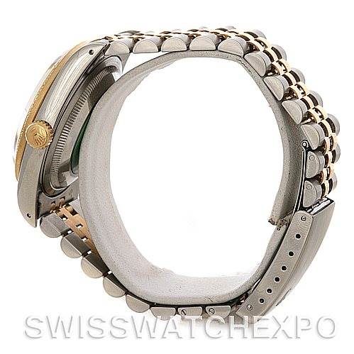 The image shows a side view of a Rolex Datejust 16233 Men's Steel and Gold (two tone) Champagne Dial 16233 Men's Steel and Gold (two tone) Champagne Dial watch, highlighting its bracelet and crown.