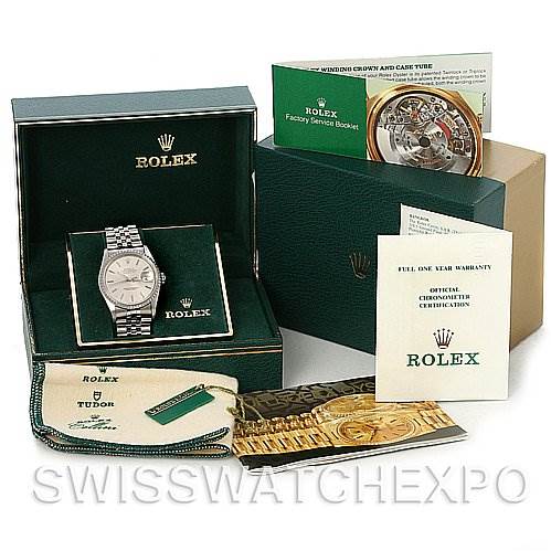 The image shows a Rolex Datejust 16220 Men's Stainless Steel Silver Dial 16220 Men's Stainless Steel Silver Dial watch with its box, manuals, warranty, and cleaning cloth, all displayed from a frontal angle.