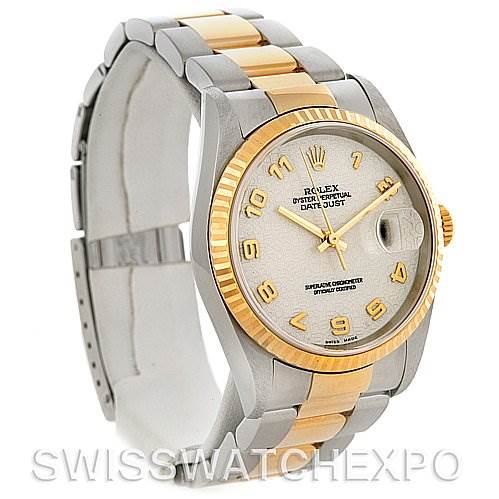 The image shows a Rolex Datejust 16233 Men's Steel and Gold (two tone) Beige Dial 16233 Men's Steel and Gold (two tone) Beige Dial watch from a front-left angle, highlighting its two-tone bracelet, fluted bezel, and dial detailing.