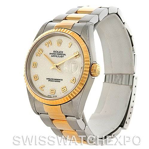 This image shows the Rolex Datejust 16233 Men's Steel and Gold (two tone) Beige Dial 16233 Men's Steel and Gold (two tone) Beige Dial watch at an angled view, highlighting its dial, bezel, case, and two-tone bracelet.