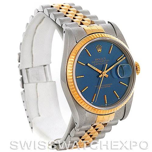 The image shows a Rolex Datejust 16233 Men's Steel and Gold (two tone) Blue Dial 16233 Men's Steel and Gold (two tone) Blue Dial watch from a front-right angle, highlighting its blue dial, jubilee bracelet, and gold bezel.