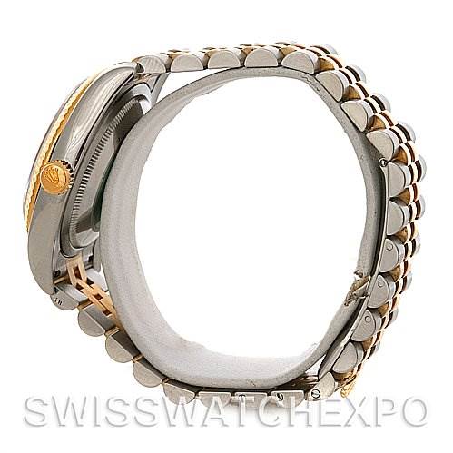 The image shows a side view of a Rolex Datejust 116233 Men
s Stainless Steel Blue Dial 116233 Men
s Stainless Steel Blue Dial watch, focusing on the bracelet and partially visible crown.