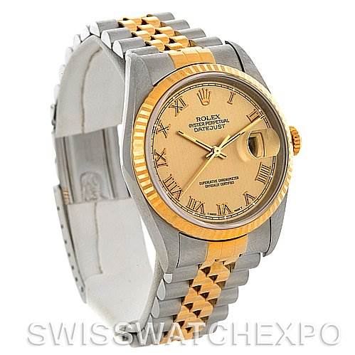 This image shows a Rolex Datejust 16233 Men's Steel and Gold (two tone) Champagne Dial 16233 Men's Steel and Gold (two tone) Champagne Dial watch angled to display its dial, fluted bezel, and jubilee bracelet with two-tone design.