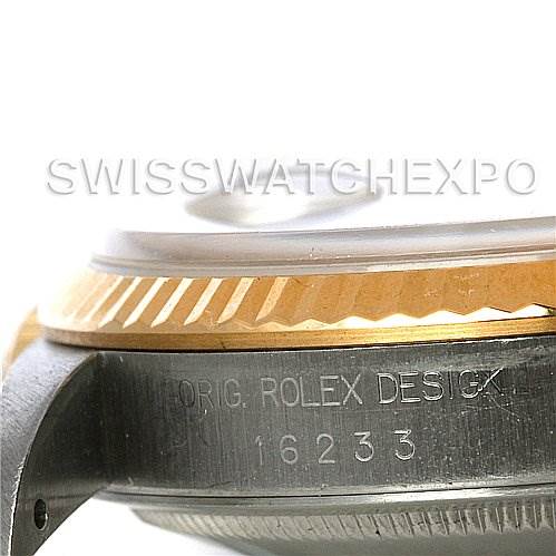 This image shows the side profile of a Rolex Datejust 16233 Men's Steel and Gold (two tone) Champagne Dial 16233 Men's Steel and Gold (two tone) Champagne Dial watch, highlighting the case with its serial number and the edge of the bezel.