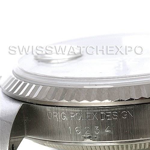 The image shows a close-up side view of a Rolex Datejust 16234 Men's Stainless Steel Grey Dial 16234 Men's Stainless Steel Grey Dial watch's bezel and case, featuring the engraved model number 16234.