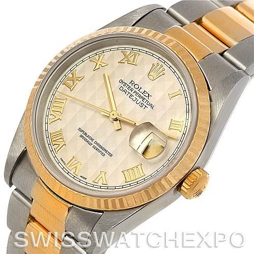 The image shows a top view of a Rolex Datejust 16233 Men's Steel and Gold (two tone) Beige Dial 16233 Men's Steel and Gold (two tone) Beige Dial watch, highlighting its two-tone bracelet, fluted bezel, and Roman numeral dial.