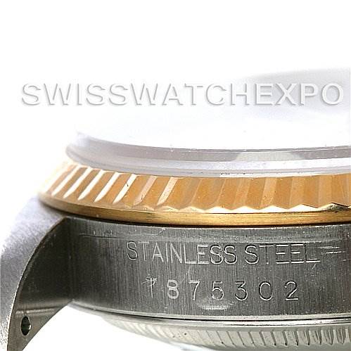 This image shows a close-up side angle of the Rolex Datejust 16233 Men's Steel and Gold (two tone) Beige Dial 16233 Men's Steel and Gold (two tone) Beige Dial watch, highlighting its stainless steel case and fluted bezel.
