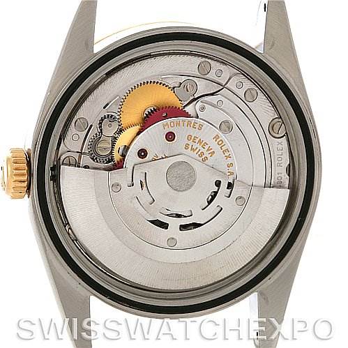 This image shows the back view of the Rolex Datejust 16233 Men's Steel and Gold (two tone) Beige Dial 16233 Men's Steel and Gold (two tone) Beige Dial watch, highlighting its internal mechanical movement.