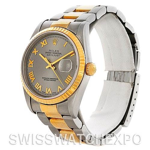 This image shows a Rolex Datejust 16233 Men's Steel and Gold (two tone) Grey Dial 16233 Men's Steel and Gold (two tone) Grey Dial watch at an angled side view, highlighting its two-tone bracelet, fluted bezel, and Roman numeral dial.