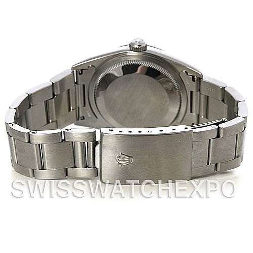 The image shows the back view of a Rolex Datejust 16200 Men's Stainless Steel Beige Dial 16200 Men's Stainless Steel Beige Dial watch, highlighting the stainless steel case and Oyster bracelet with the clasp.