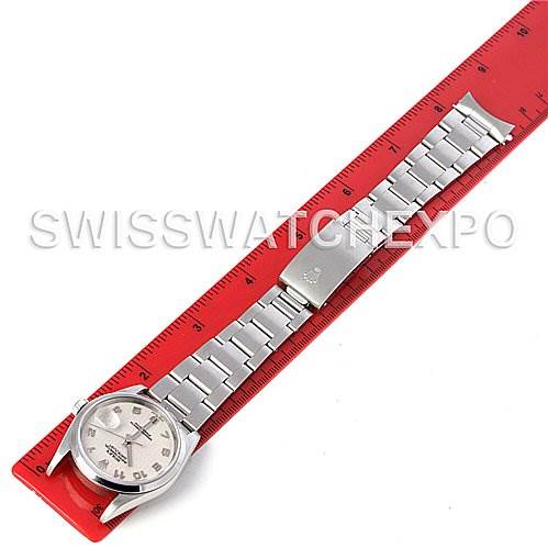 The image shows a Rolex Datejust 16200 Men's Stainless Steel Beige Dial 16200 Men's Stainless Steel Beige Dial watch laid flat, with the entire length of the watch band and face measured against a red ruler.