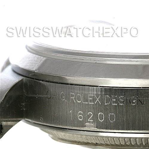 The image shows a close-up of the case side and bezel of a Rolex Datejust 16200 Men's Stainless Steel Black Dial 16200 Men's Stainless Steel Black Dial model 16200, with the engraved serial number visible.