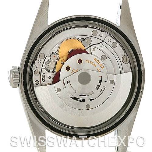 This image shows the internal mechanism of a Rolex Datejust 16200 Men's Stainless Steel Black Dial 16200 Men's Stainless Steel Black Dial watch from a back angle, highlighting the movement and gears.