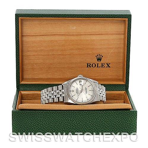 The Rolex Datejust 16234 Men's Stainless Steel Silver Dial 16234 Men's Stainless Steel Silver Dial watch is shown front-facing inside an open green and wooden Rolex box.