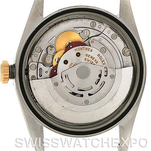 The image shows a close-up of the Rolex Datejust 16233 Men's Steel and Gold (two tone) White Dial 16233 Men's Steel and Gold (two tone) White Dial movement from the back, exposing its inner mechanical parts.
