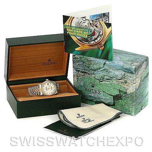The image shows a Rolex Datejust 16233 Men's Steel and Gold (two tone) White Dial 16233 Men's Steel and Gold (two tone) White Dial watch at an angle, with its box, warranty card, booklet, and cleaning cloth.