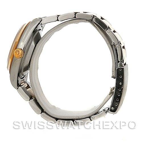 The image shows a side view of a Rolex Datejust 16203 Men's Steel and Gold (two tone) White Dial 16203 Men's Steel and Gold (two tone) White Dial watch, highlighting its crown, case, and bracelet.