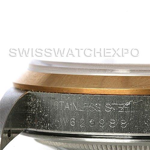 This image shows a close-up of the side of a Rolex Datejust 16203 Men's Steel and Gold (two tone) White Dial 16203 Men's Steel and Gold (two tone) White Dial watch case, highlighting the stainless steel material and serial number.