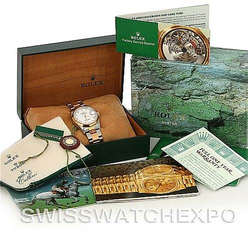 The image shows a Rolex Datejust 16203 Men's Steel and Gold (two tone) White Dial 16203 Men's Steel and Gold (two tone) White Dial watch with its box, booklet, warranty card, and tags from a top-down angle.