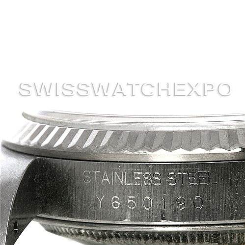 This image shows a close-up partial side view of the casing and bezel of a Rolex Datejust 16234 Men's Stainless Steel Silver Dial 16234 Men's Stainless Steel Silver Dial watch, highlighting the stainless steel material and the serial number.