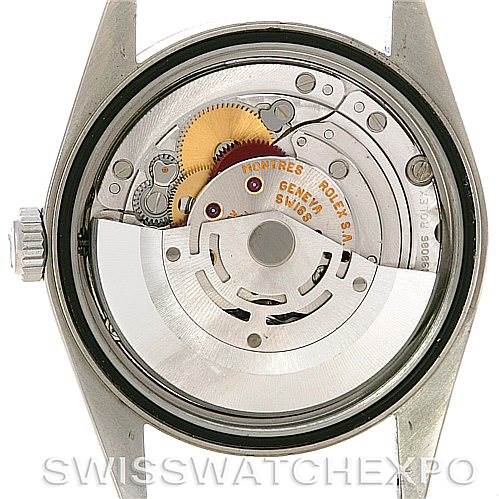 The image shows the back view of a Rolex Datejust 16234 Men's Stainless Steel Silver Dial 16234 Men's Stainless Steel Silver Dial watch, revealing its internal mechanical movement.