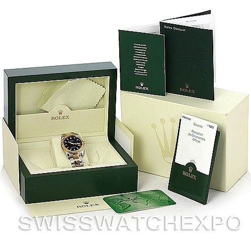 The image shows a Rolex Datejust 116233 Men's Stainless Steel Black Dial 116233 Men's Stainless Steel Black Dial watch in its box with accompanying manuals, warranty card, and cleaning cloth, photographed from the front.
