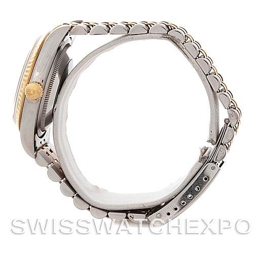 The image shows a side view of a Rolex Datejust 16233 Men's Steel and Gold (two tone) Champagne Dial 16233 Men's Steel and Gold (two tone) Champagne Dial watch, highlighting the bezel, crown, and jubilee bracelet.