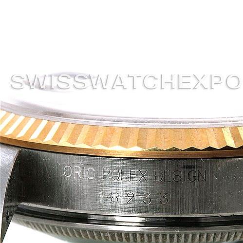 This image shows a close-up side view of the Rolex Datejust 16233 Men's Steel and Gold (two tone) Champagne Dial 16233 Men's Steel and Gold (two tone) Champagne Dial model's case, highlighting the fluted bezel and engraved reference number.