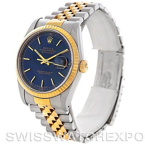 The image shows a Rolex Datejust 16233 Men's Steel and Gold (two tone) Blue Dial 16233 Men's Steel and Gold (two tone) Blue Dial watch from an angled view, featuring its face, crown, bezel, case, and bracelet.